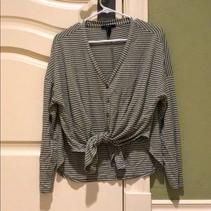 green and white longe sleeved striped shirt